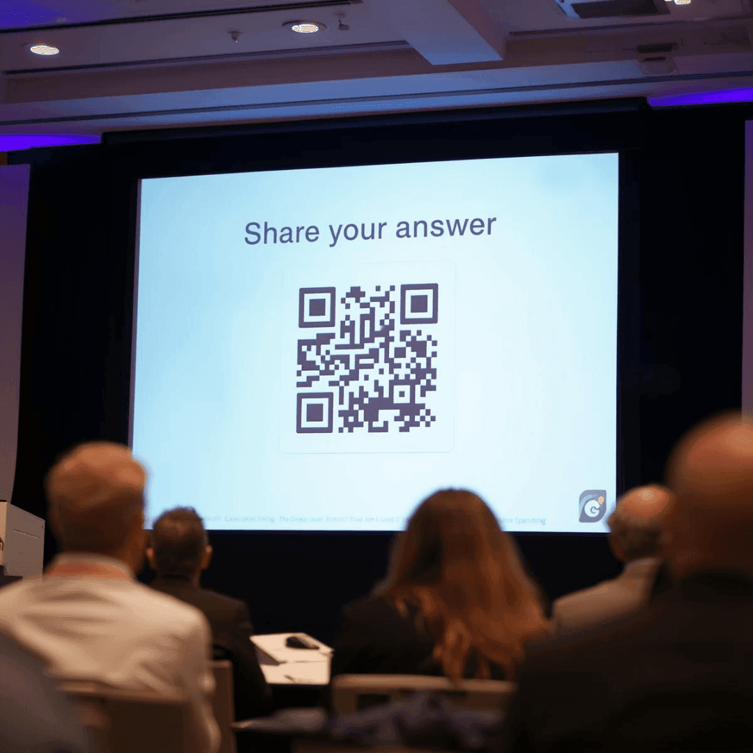QR code survey placed on presentation slides for collecting event feedback
